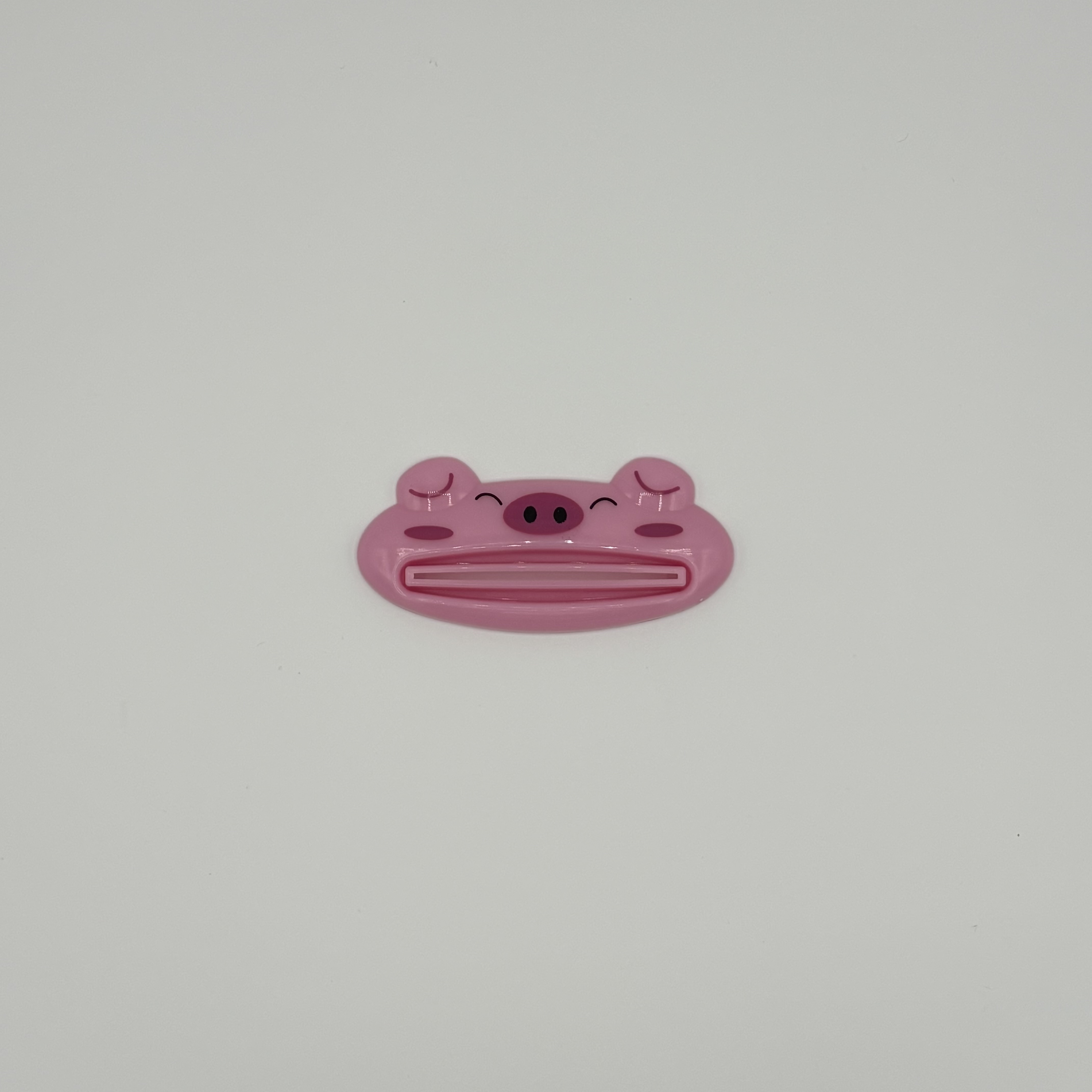 Hambapastatuubi pigistaja põrsas