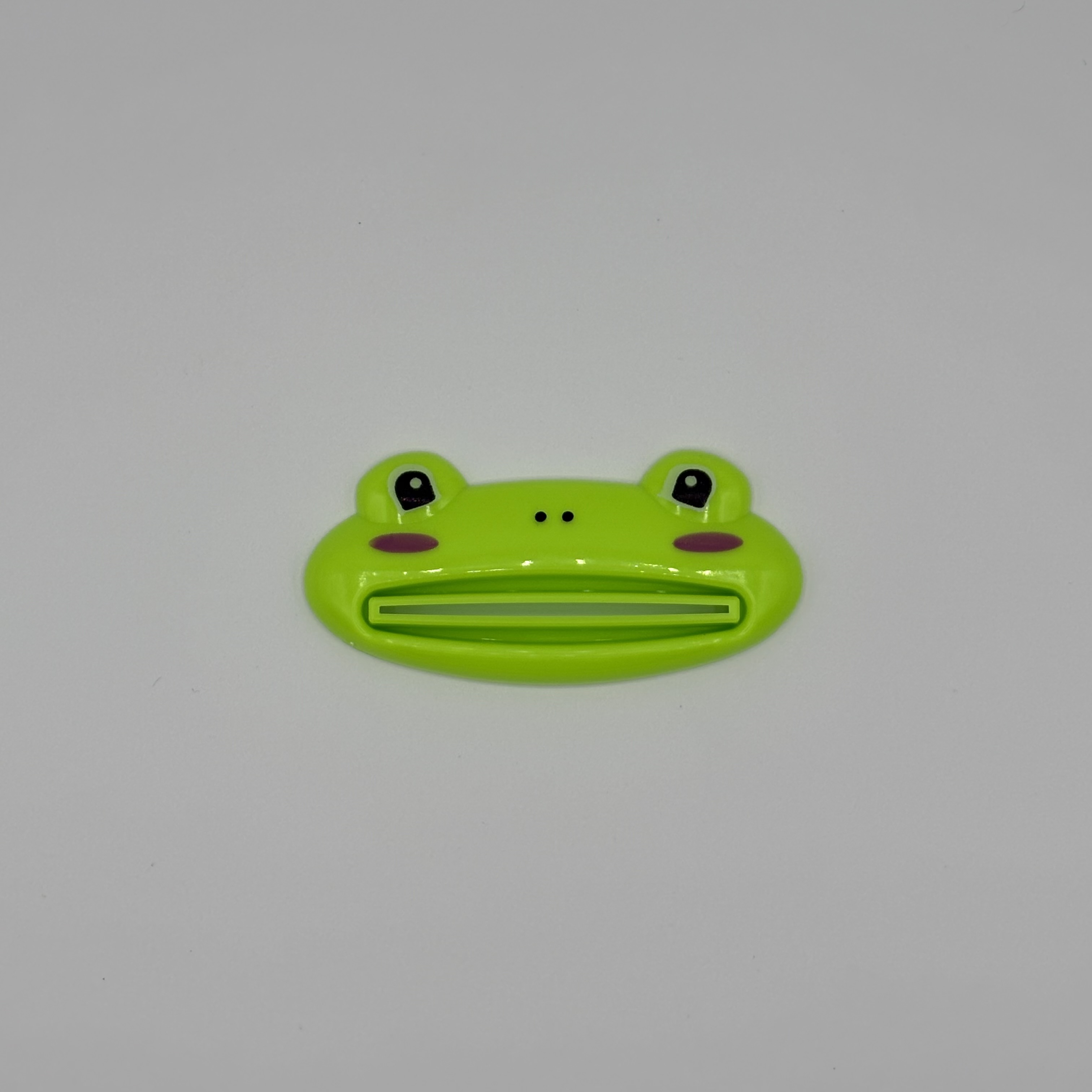 Hambapastatuubi pigistaja konn