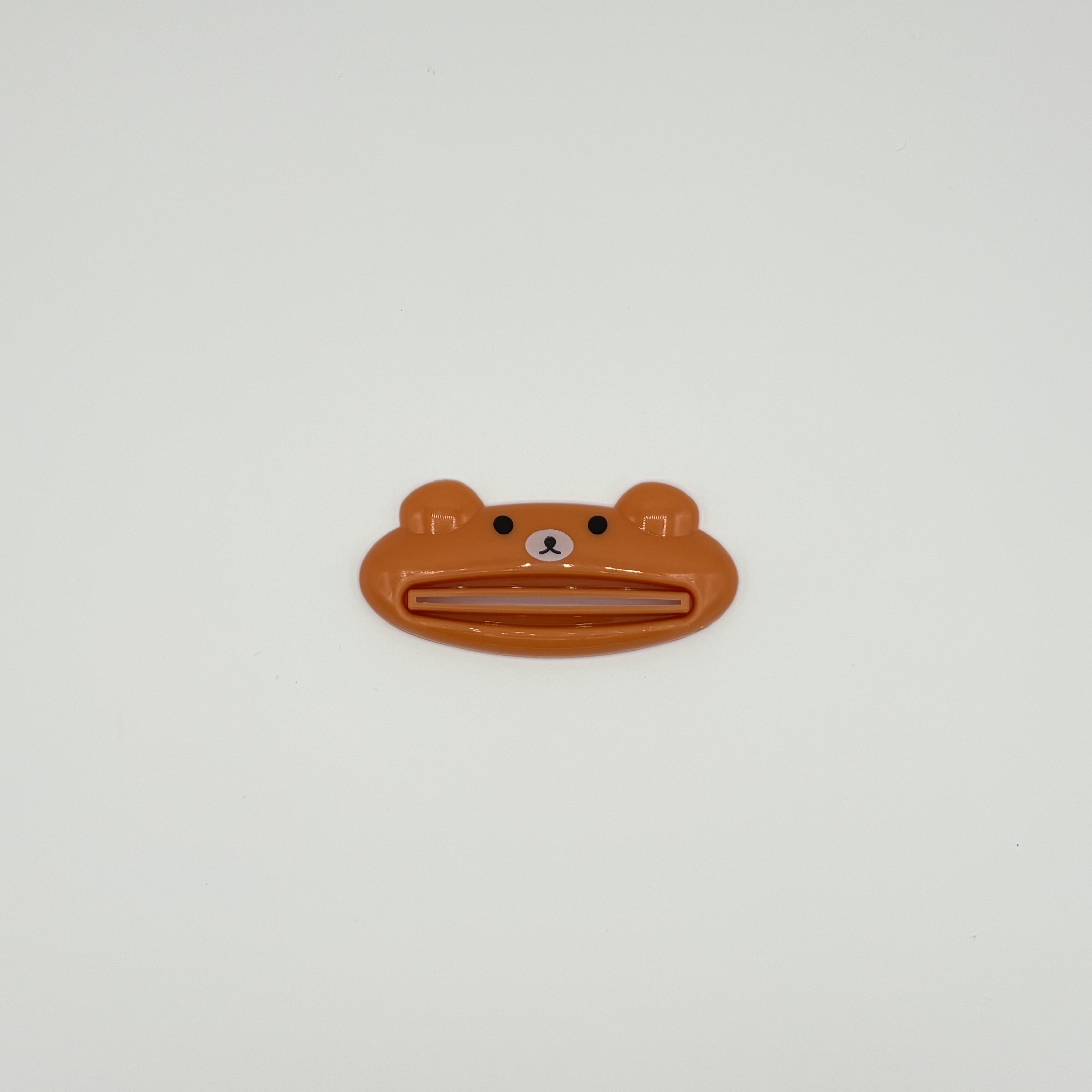 Hambapastatuubi pigistaja karu