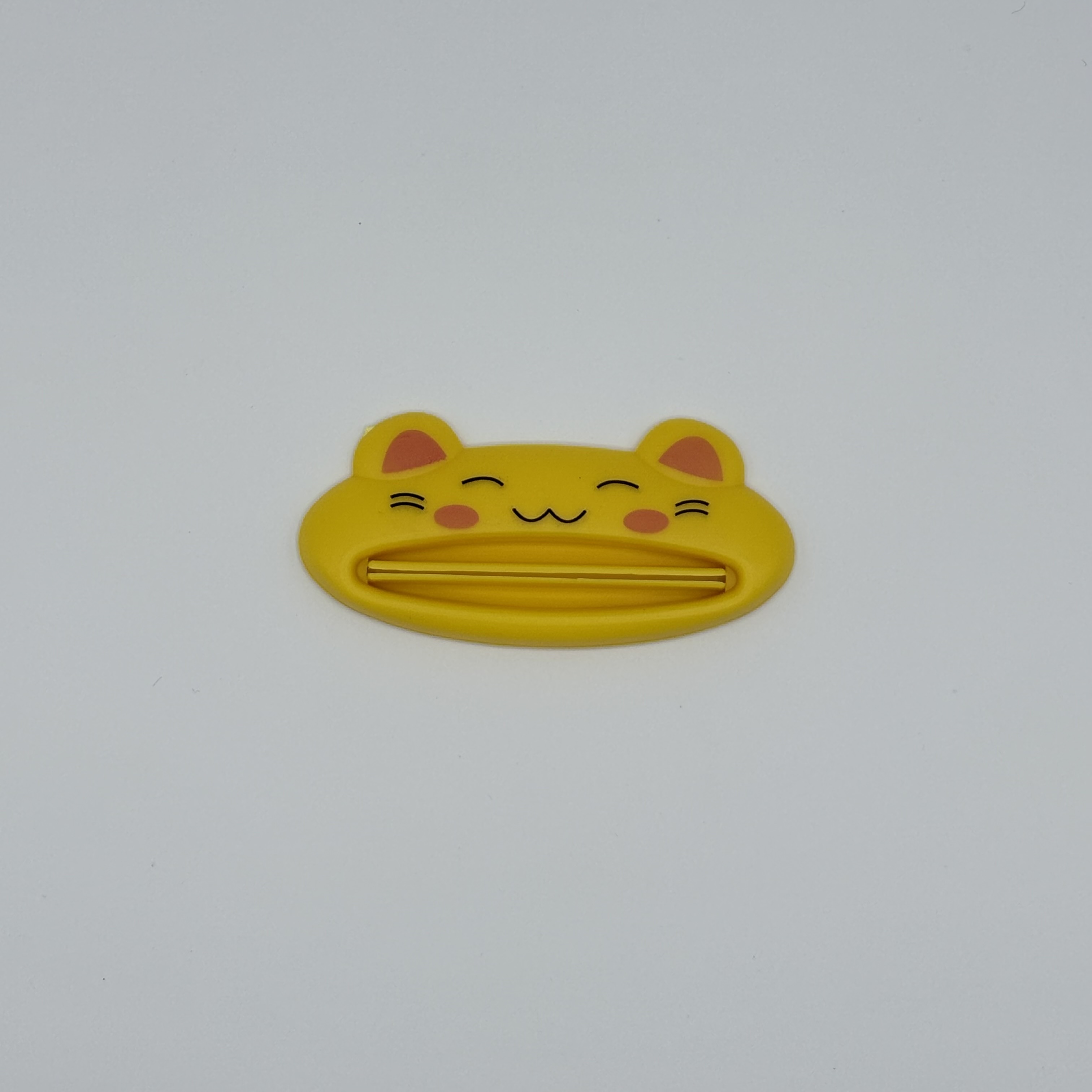 Hambapastatuubi pigistaja kass